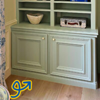 Image of a baseboard cabinet with baseboard installed over the toekick. For a post about how to cover toe kick with baseboard.