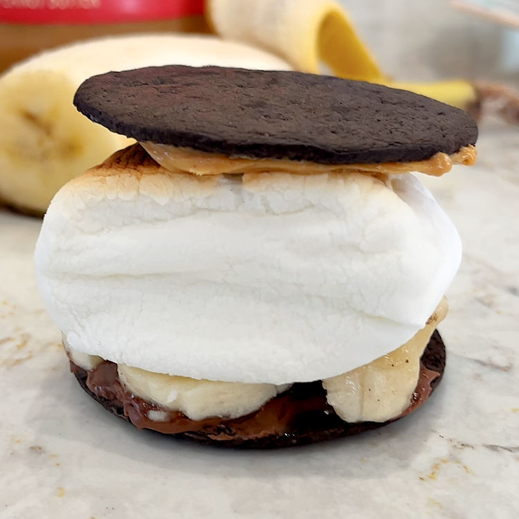Chocolate wafer, peanut butter, chocolate hazelnut spread, banana, and marshmallow Smores.