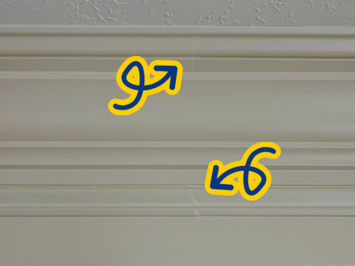 Image shows a scarf joint on 3 piece stacked crown molding.