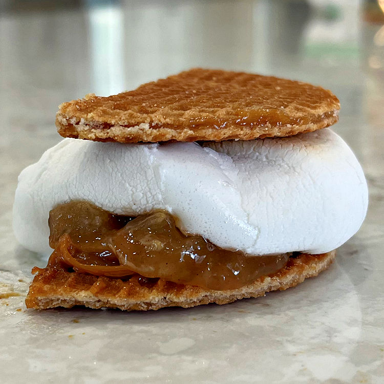 Stroopwafel Cookie Smores with dulce de leche, apple pie filling, and marshmallow.