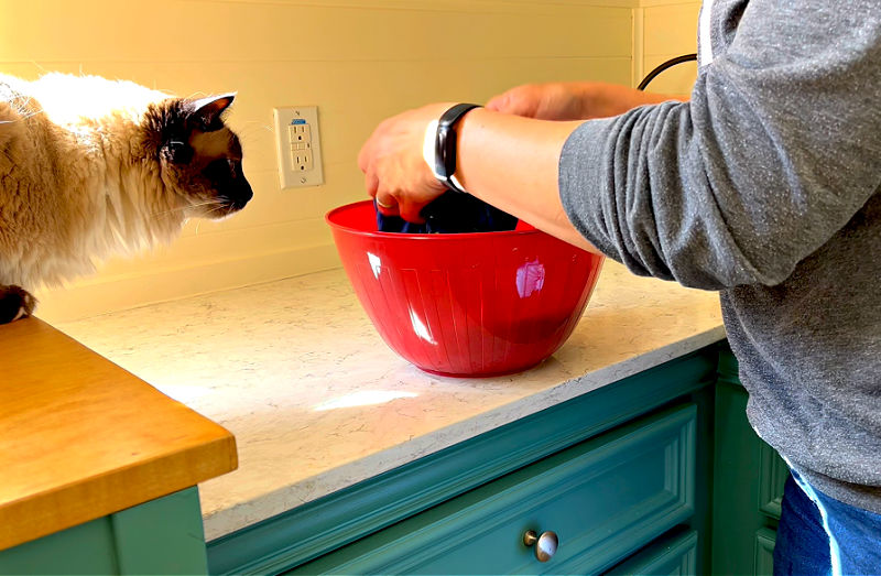 Soaking bad smelling gym clothes before washing them.