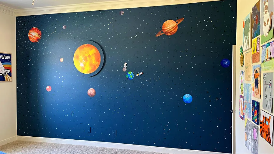 Outer Space Wall Mural in a kids space themed room.