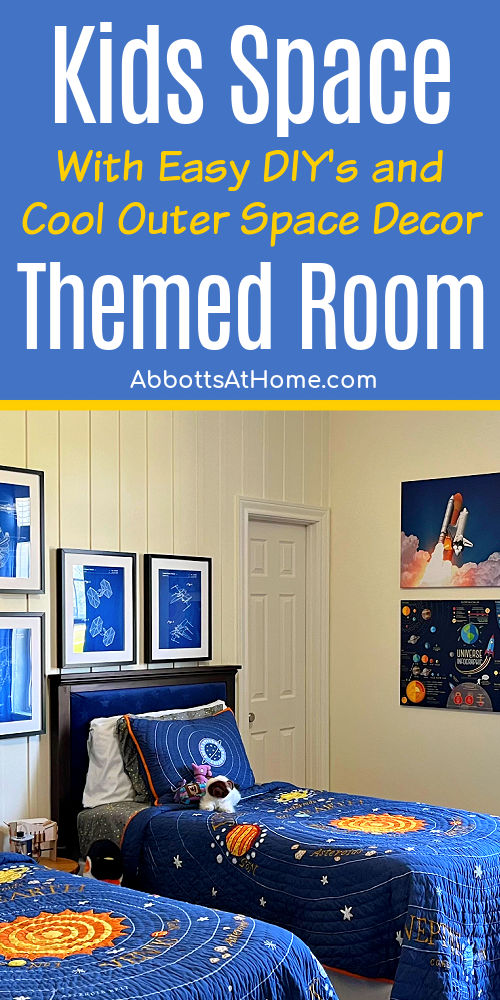 Image of a kids or teen space themed bedroom with cool space decor, Star Wars blueprints, NASA wall art, and solar system quilt from Pottery Barn.
