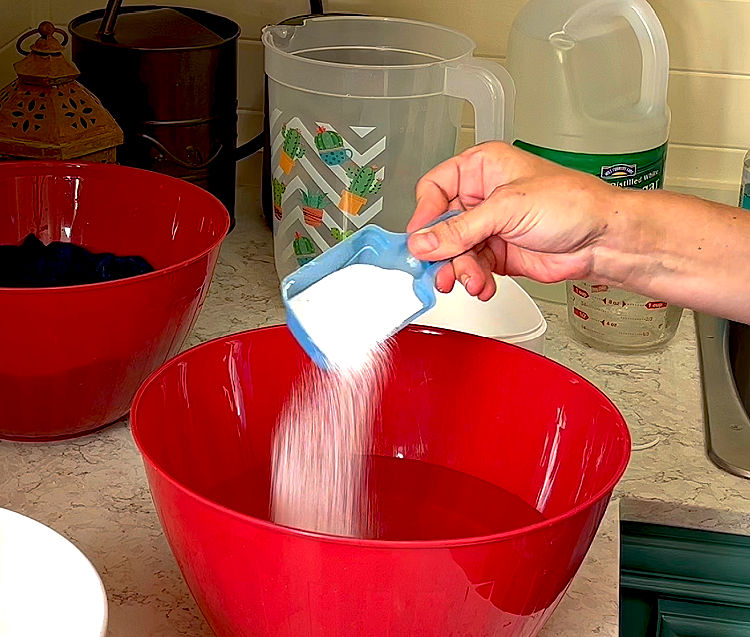 Mixing OxiClean Odor Blasters to get rid of sweat smells in shirts and gym clothes.