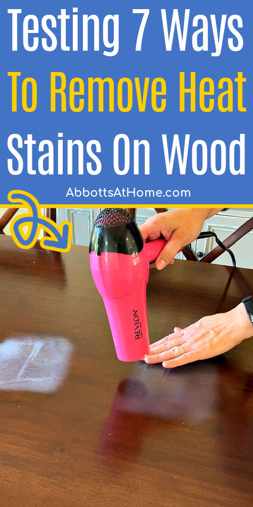 Image shows how to remove a heat mark on wood with a blow dryer. For a post about ways to get rid of heat stains on wood tables.