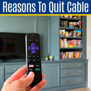 Image of a Roku remote in front of a TV for a post with the 11 Best Reasons to cut the cord with cable tv. With tips for how to ditch cable and why you should.