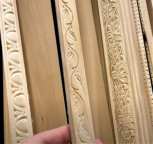 Using decorative wood leaf trim to finish plywood edges on bookshelves and open cabinets.