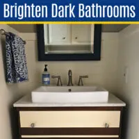 Image of a dark bathroom for a post with 10 ways to make a dark bathroom feel brighter.