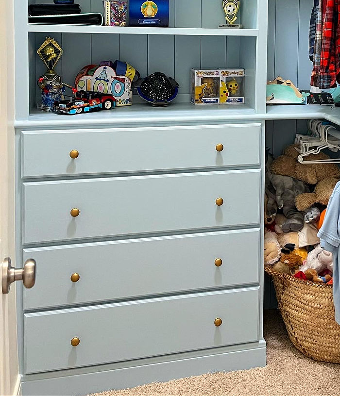 Image of a diy built in dresser in closet for a post about how to build a closet dresser and shelves for DIY small walk in closet built ins.