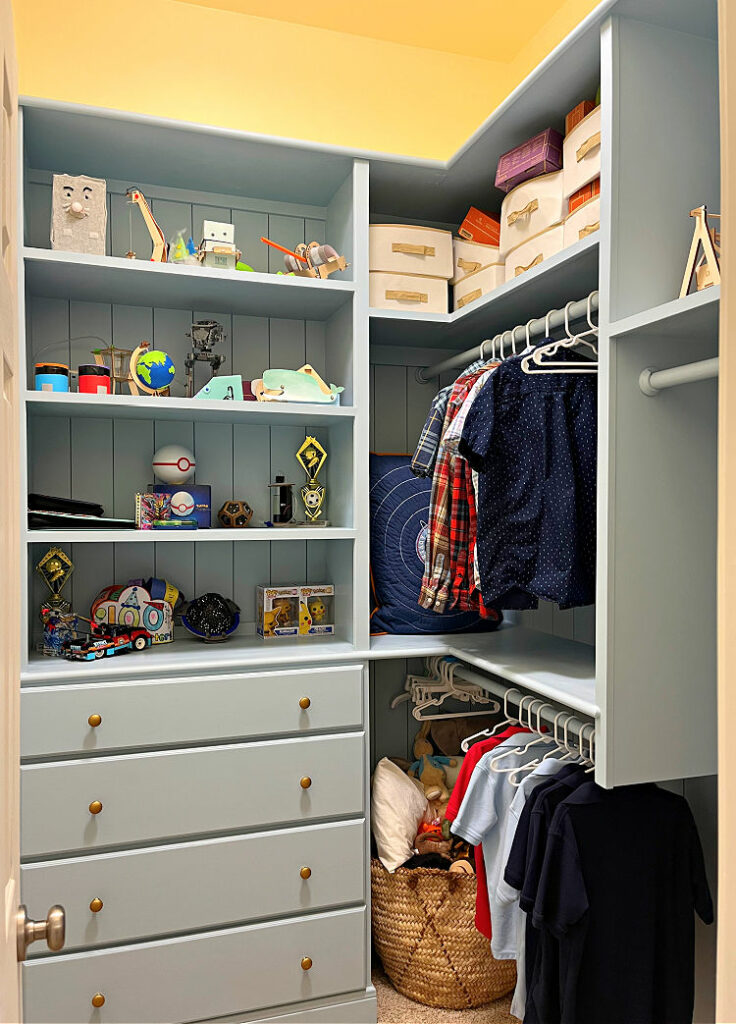 Image of small walk in closet built ins with lots of storage and closet organization design ideas.