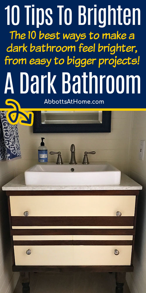 Image of a dark bathroom for a post with 10 ways to make a dark bathroom feel brighter.