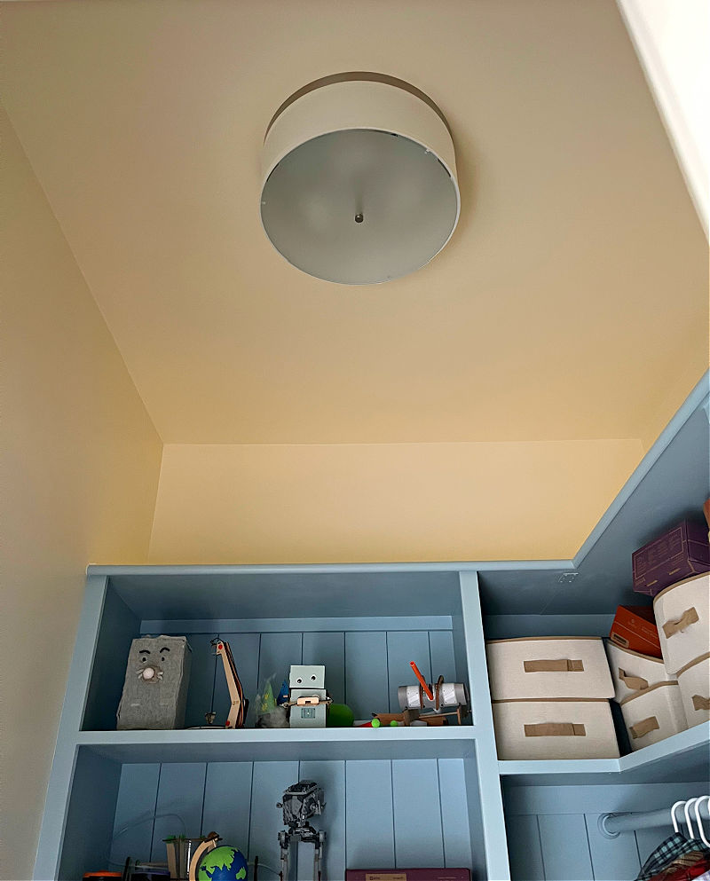 A 3-bulb light fixture can brighten a dark closet.