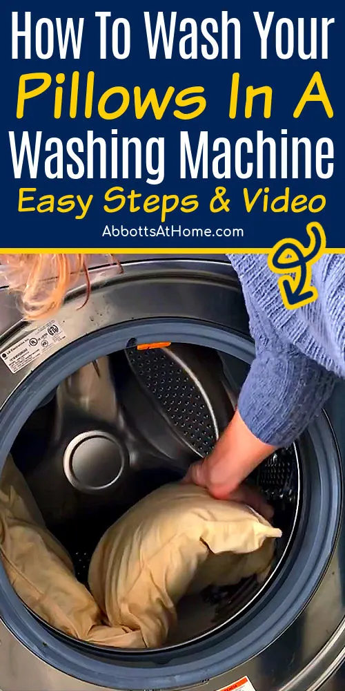 Image of someone washing pillows in a washing machine for a post about how to wash pillows in a washing machine with tips for washing pillows, putting pillows in a dryer, and how often to wash pillows.