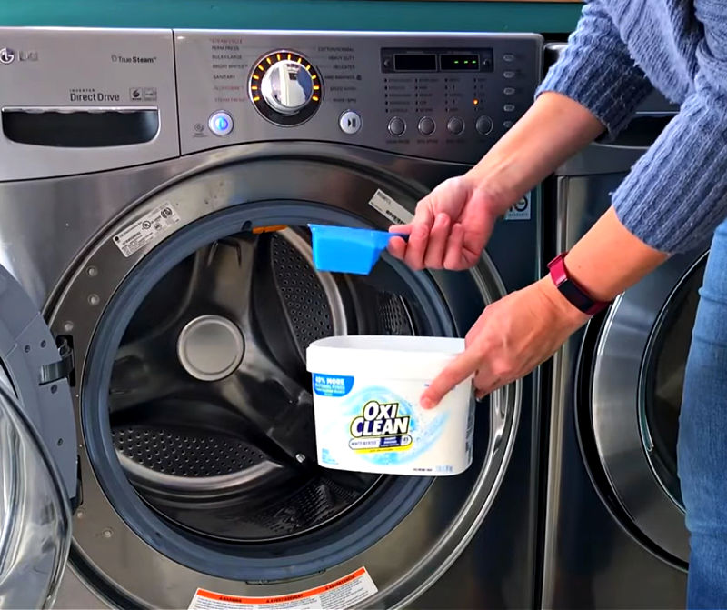 Using OxiClean White Revive to whiten yellow pillows in a washing machine.