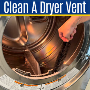 Image of someone using a dryer vent cleaning kit for a post about How To Clean Out A Dryer Vent From Inside And Outside.