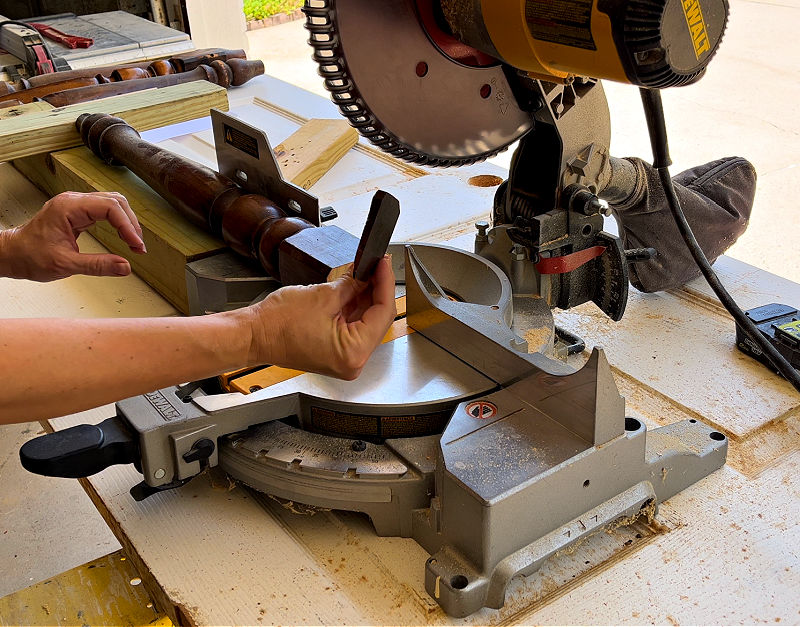 Cutting off the top of a turned leg with a Miter Saw.