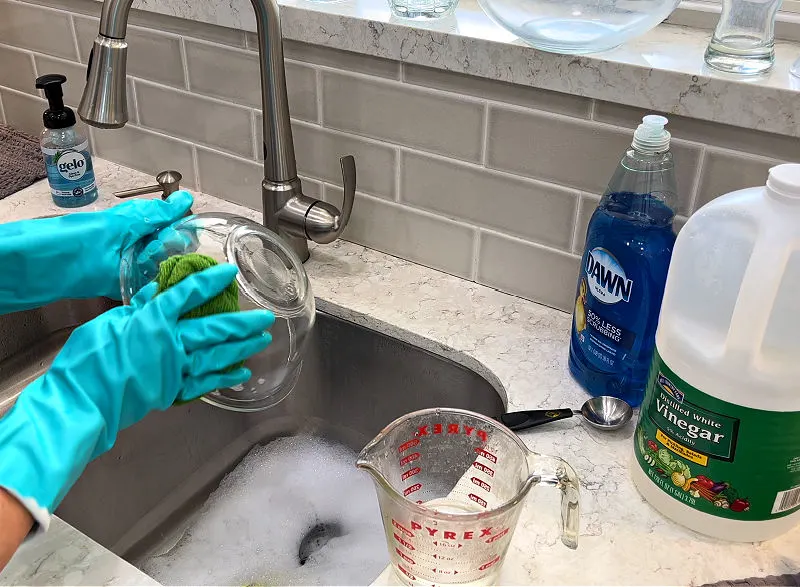 Using Vinegar to get rid of hard water spots on glassware.