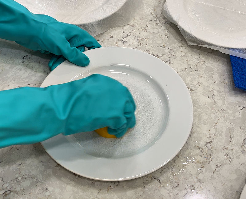 Using salt and lemon on a scratched up plate.