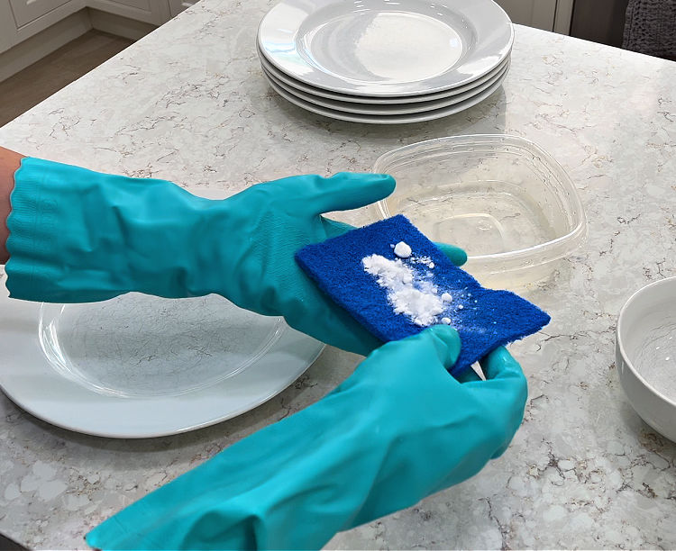 Baking soda on a non-scratch scour pad.