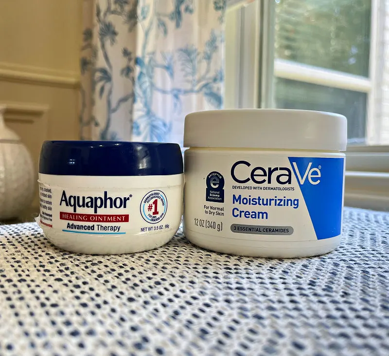 Thick cream and Aquaphor for a post about how to soften dry cracked feet in your 40's.