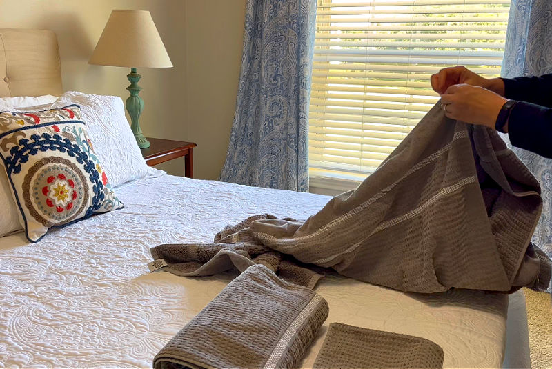 I always rewash bedding and towels before houseguests arrive.