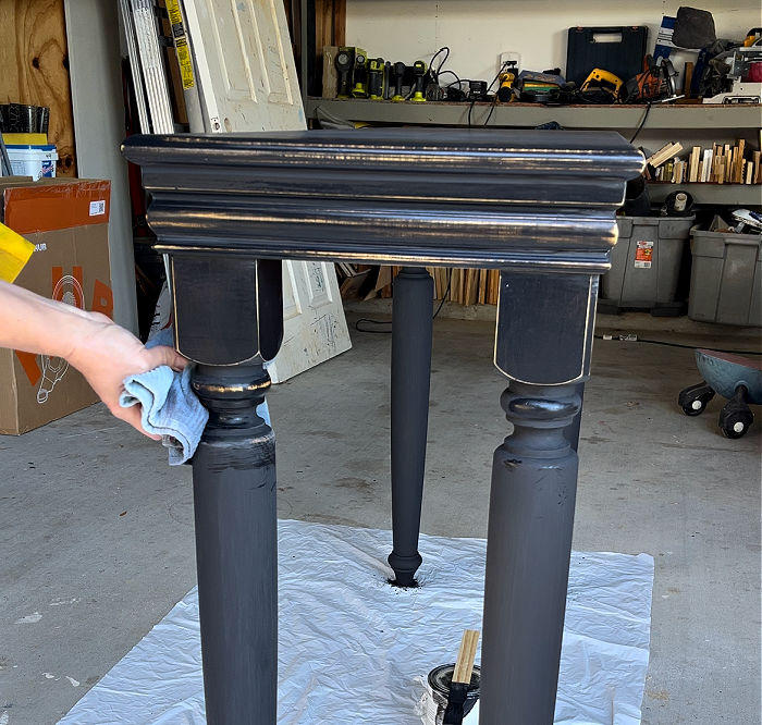 Cleaning paint residue off furniture.