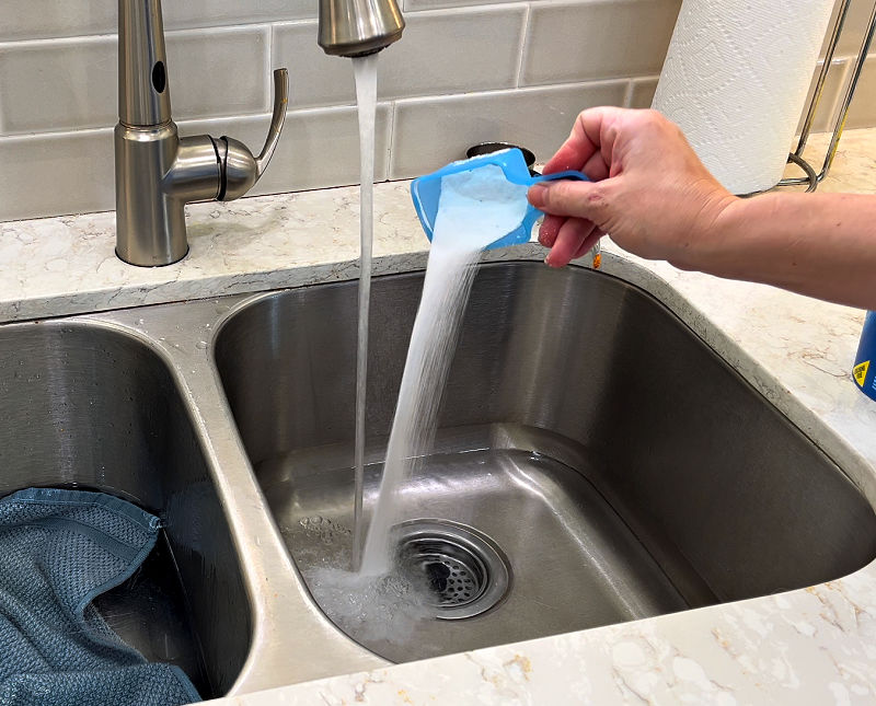 Using OxiClean Versatile to remove old laundry stains.